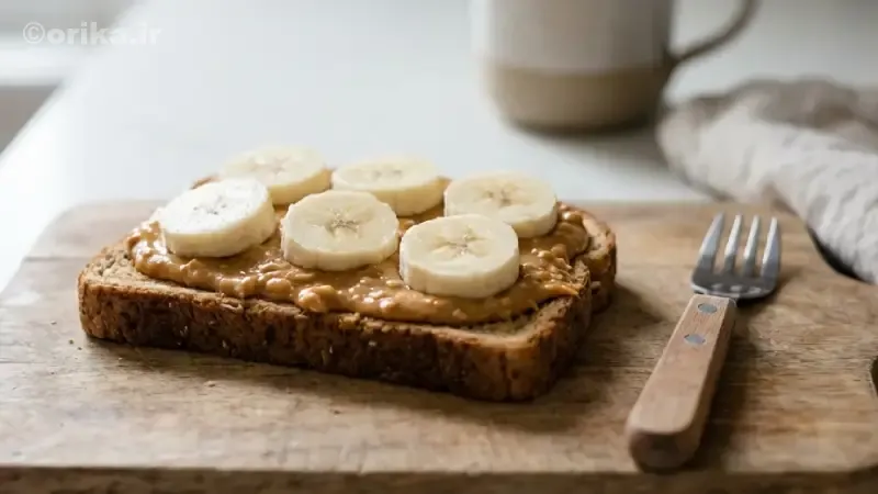 نان تست سبوسدار با کره بادامزمینی و موز